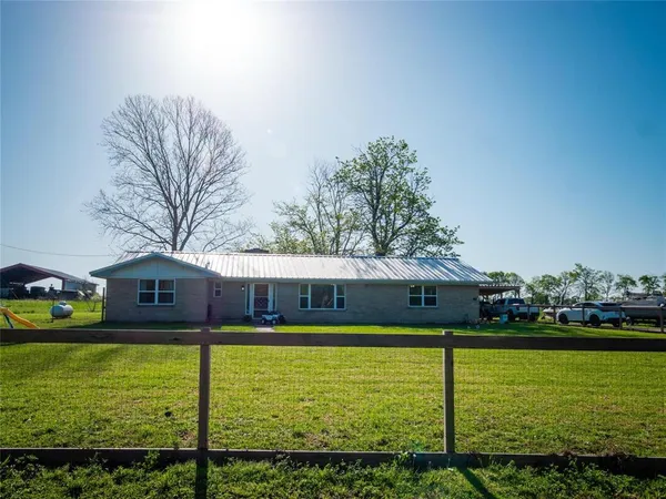 a view of a water with a building in the background