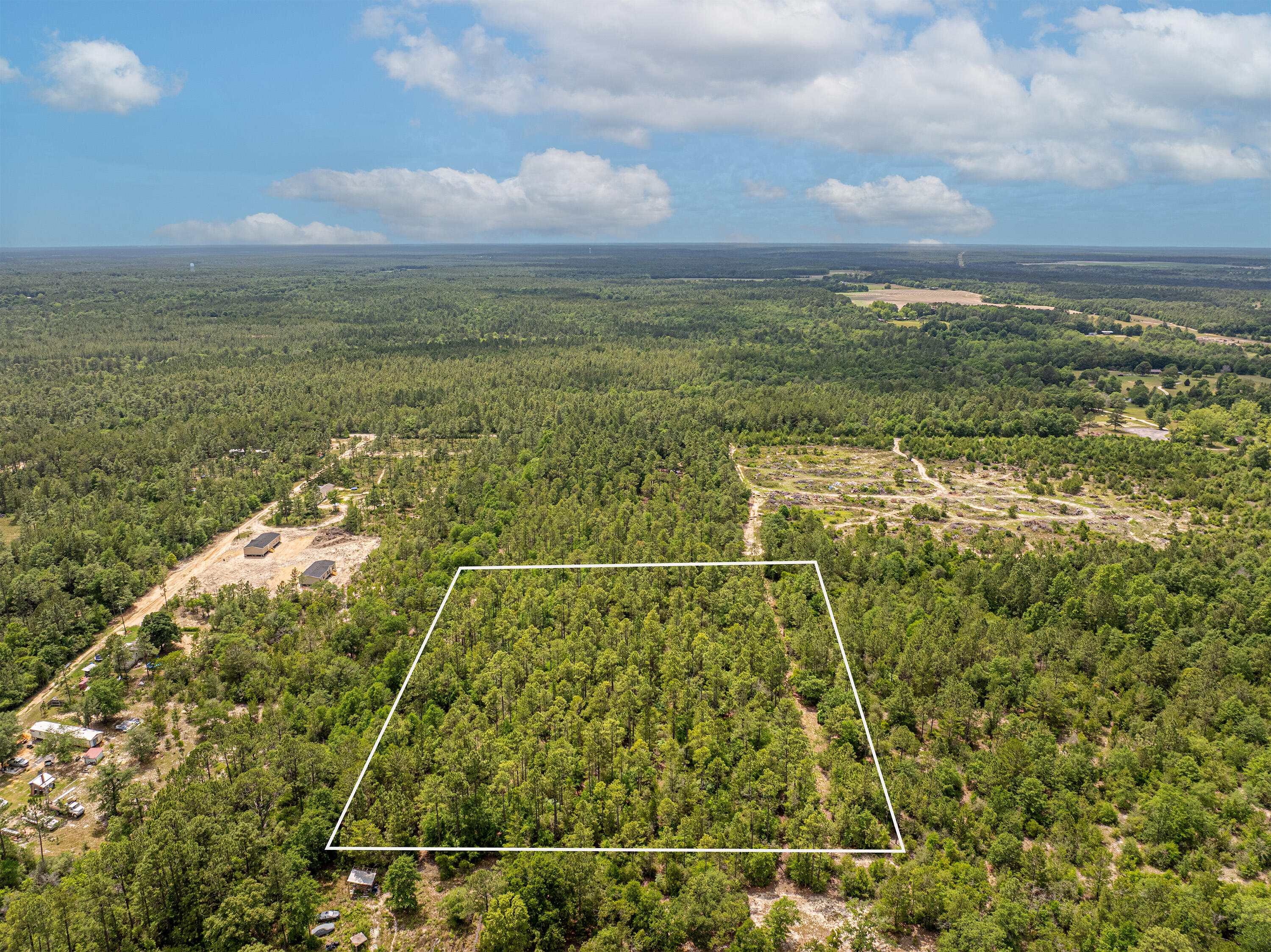 5-acres Coventry Road DeFuniak Springs, FL 32433 - Photo 4 of 4 a view of a city