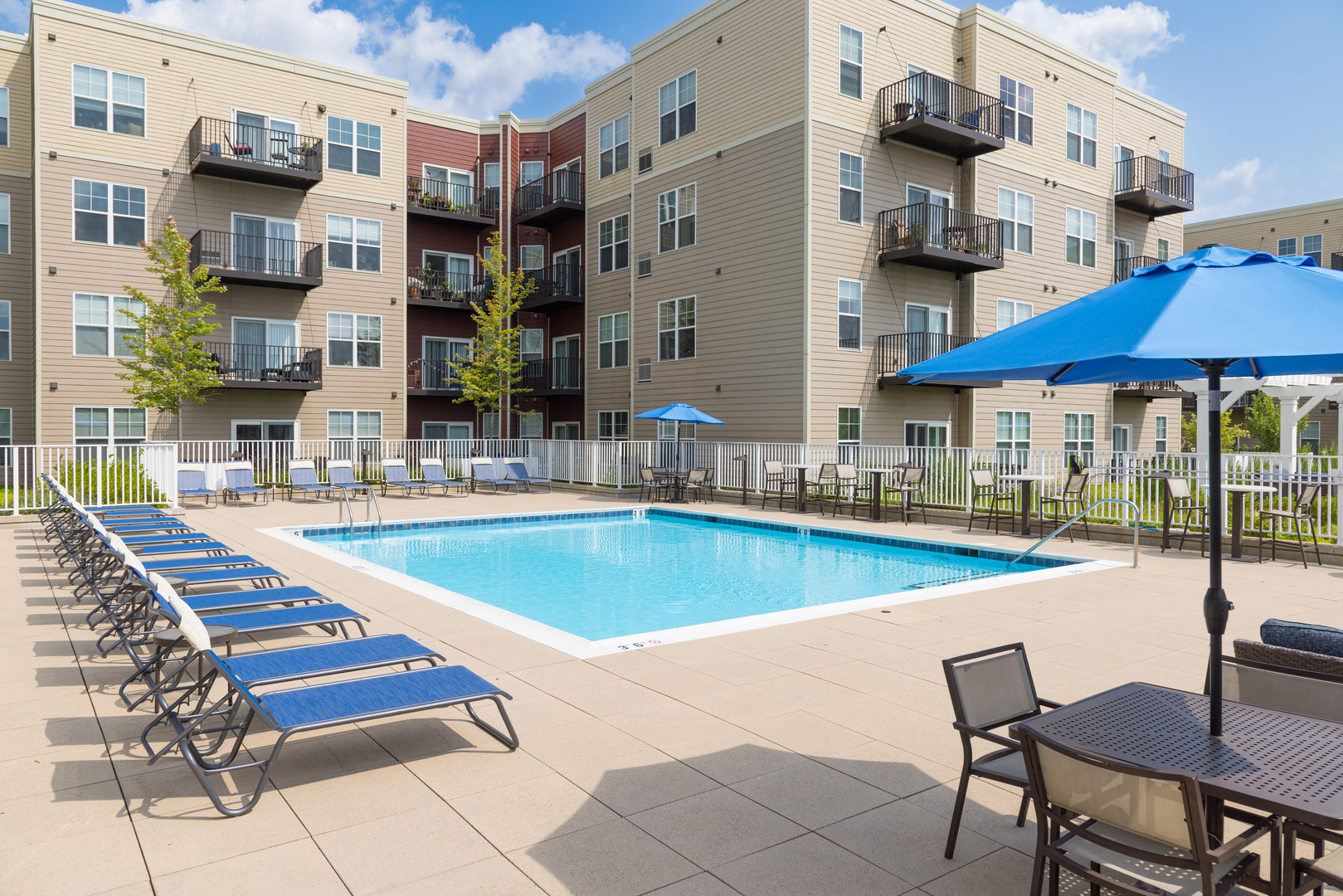 255 North Addison Avenue, Unit 654 Elmhurst, IL 60126 - Photo 13 of 23 a view of a patio with a table and chairs