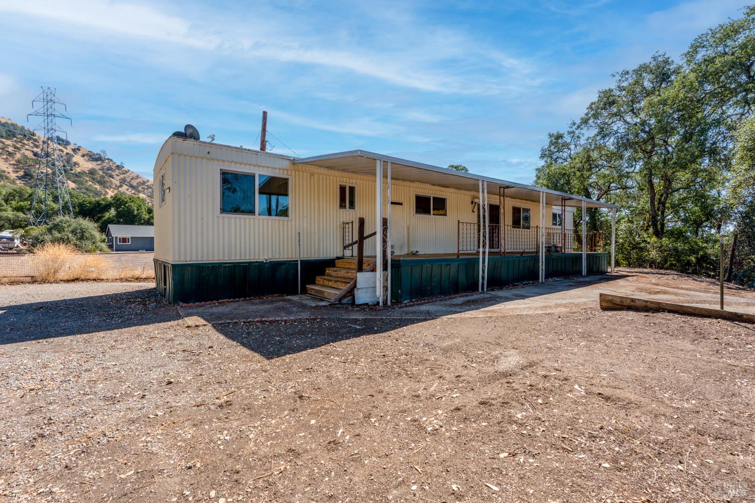 3072 Gardner Road Nice, CA 95464 - Photo 1 of 1 Covered Deck & Large Open Courtyard with Brick Bar-Be-Que
