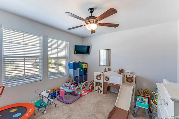 a room with toys and stairs