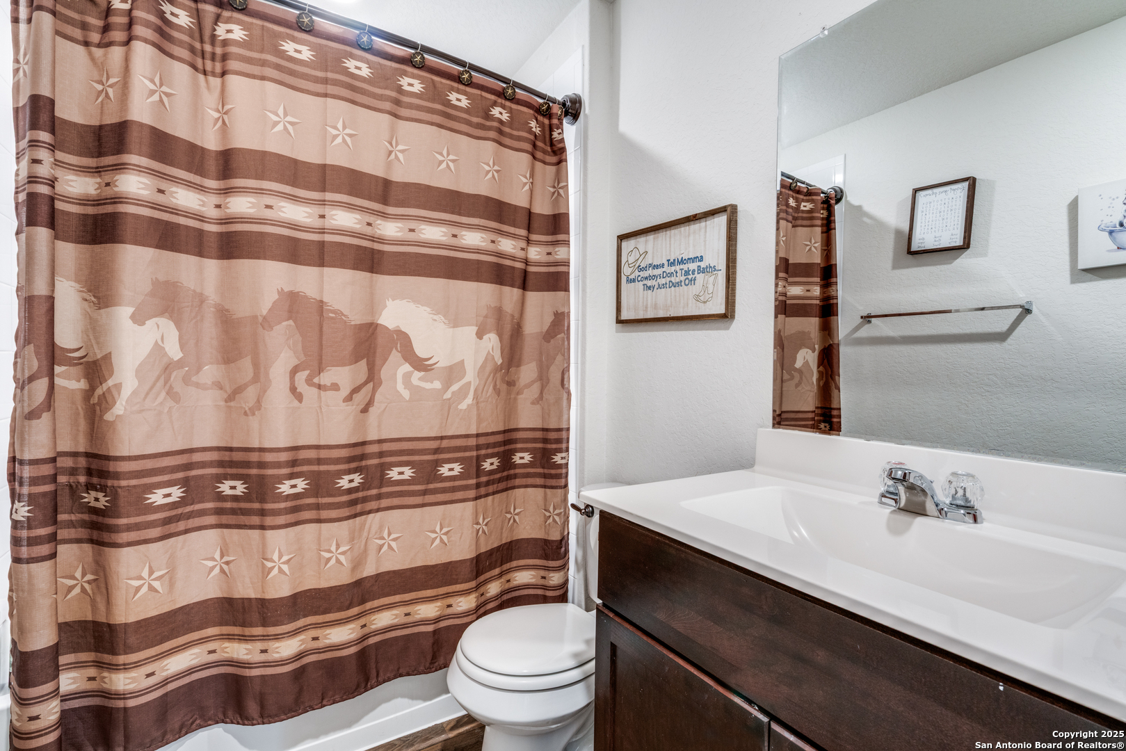 816 Indigo Way Seguin, TX 78155 - Photo 20 of 25 a bathroom with a sink and a toilet