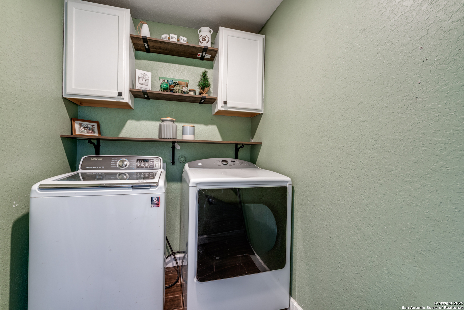 816 Indigo Way Seguin, TX 78155 - Photo 22 of 25 a utility room with dryer and washer
