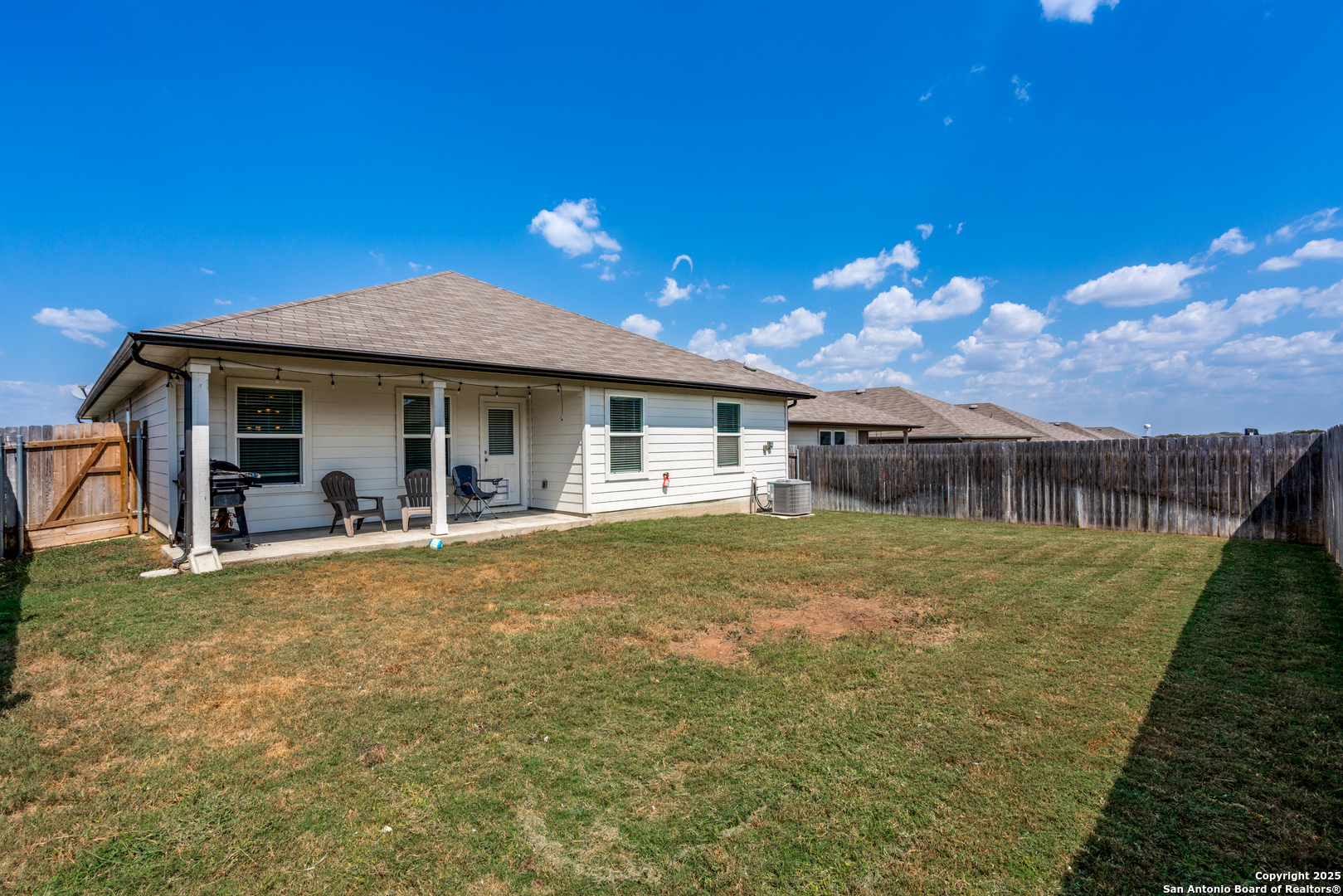 816 Indigo Way Seguin, TX 78155 - Photo 24 of 25 a view of a house with backyard and porch