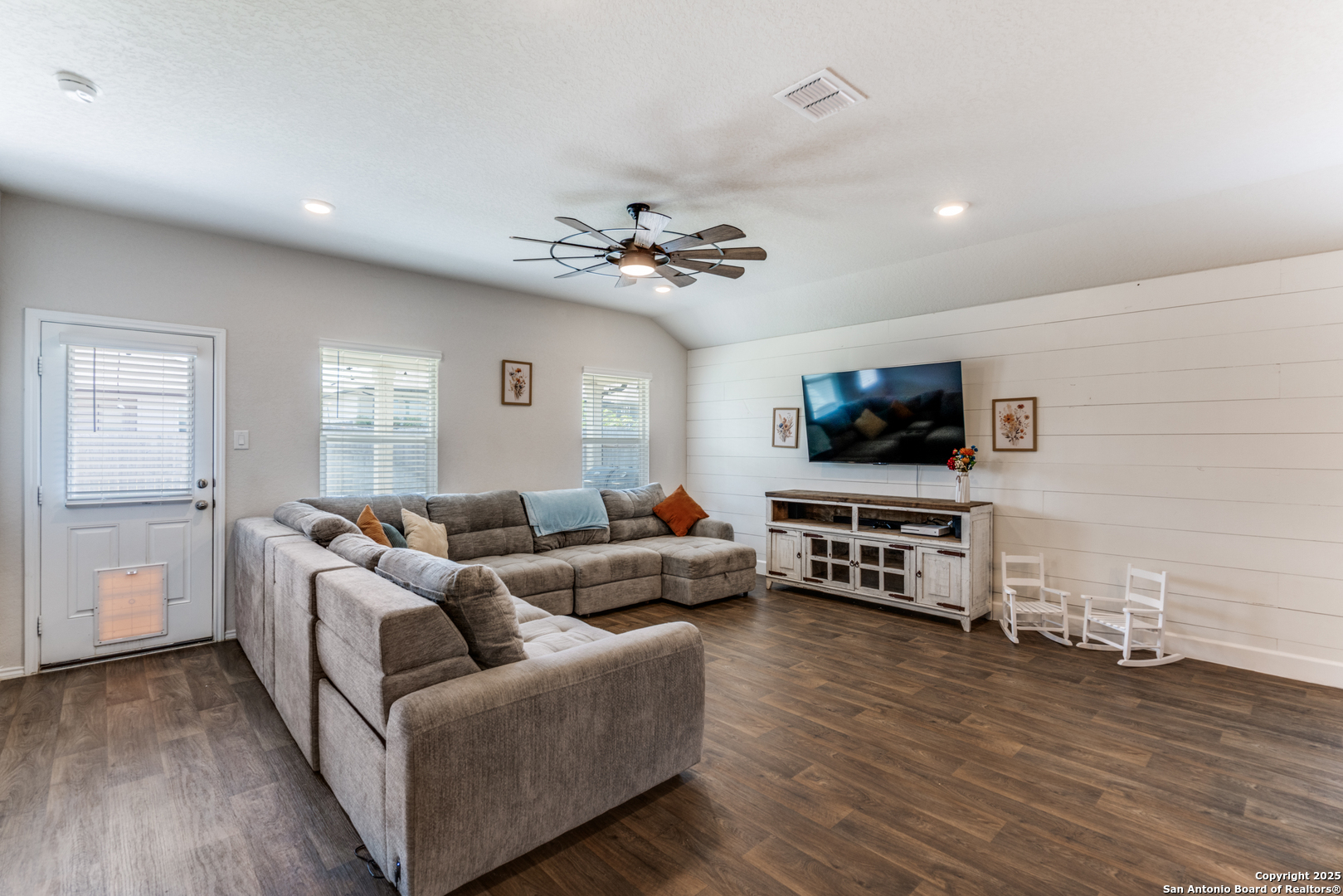 816 Indigo Way Seguin, TX 78155 - Photo 4 of 25 a living room with furniture and a flat screen tv