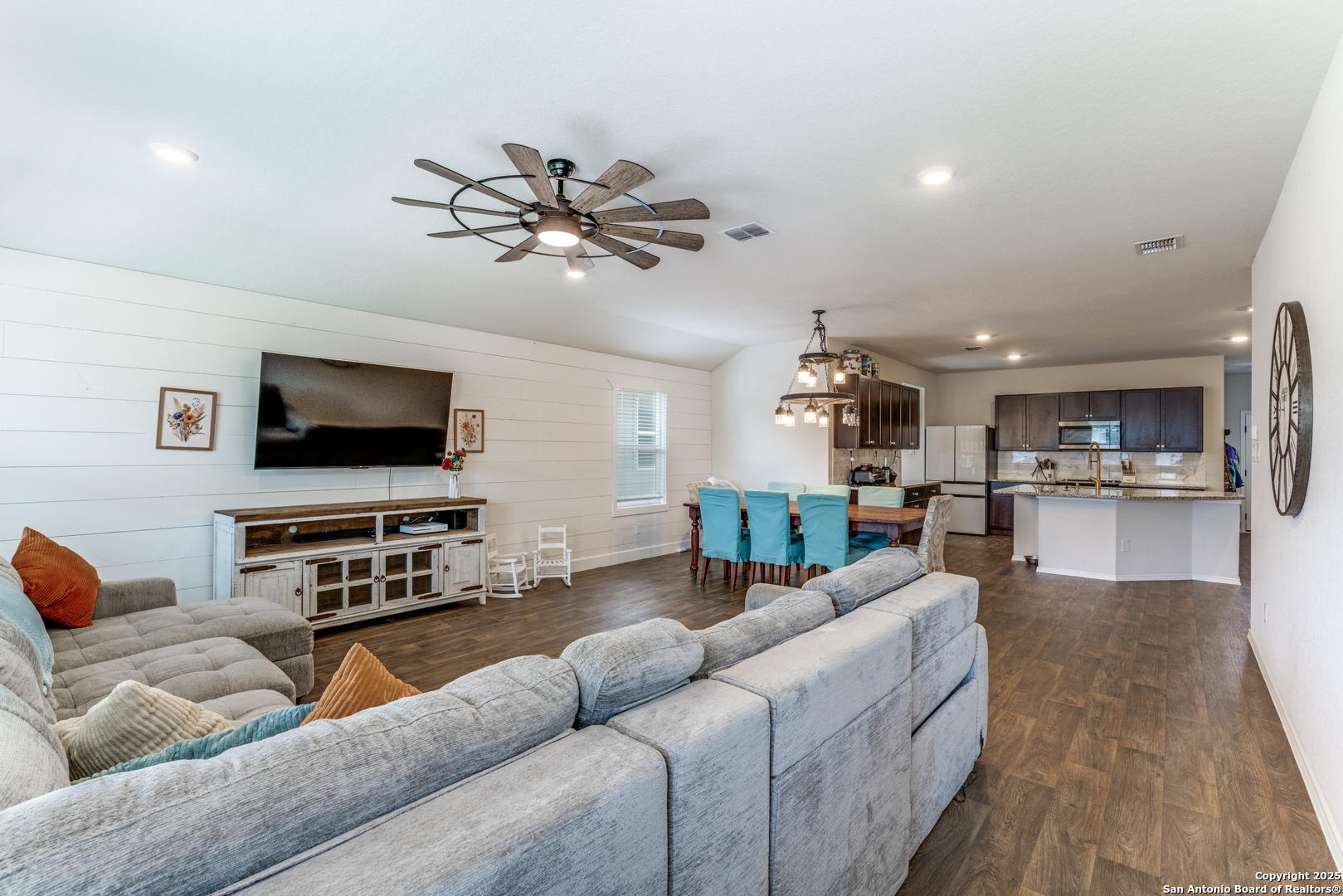 816 Indigo Way Seguin, TX 78155 - Photo 6 of 25 a living room with furniture and a flat screen tv
