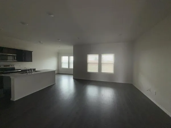 a room with furniture and a flat screen tv