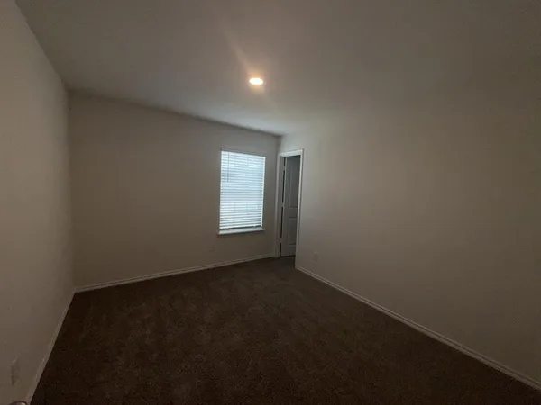 a bathroom with a toilet bathtub and shower