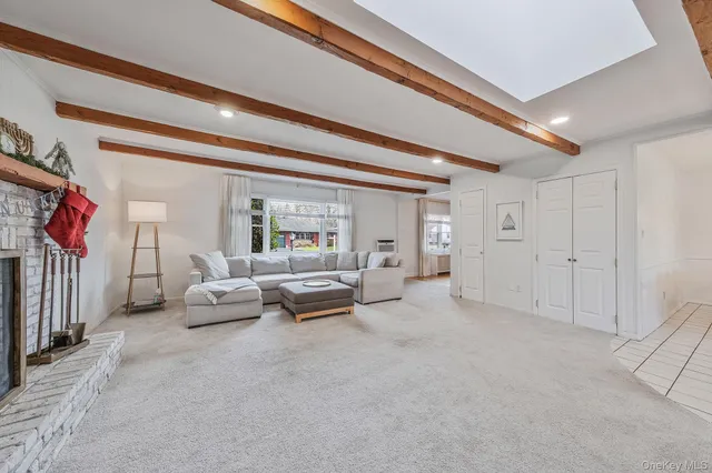 a dining room table chairs and view of a room