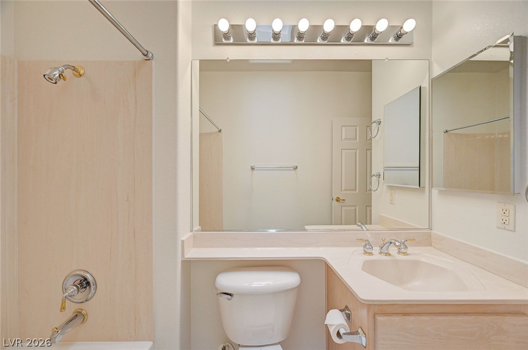 2529 Springville Way Henderson, NV 89052 - Photo 40 of 70 A well-illuminated vanity area highlights clean architectural lines and practical design in this bathroom.
