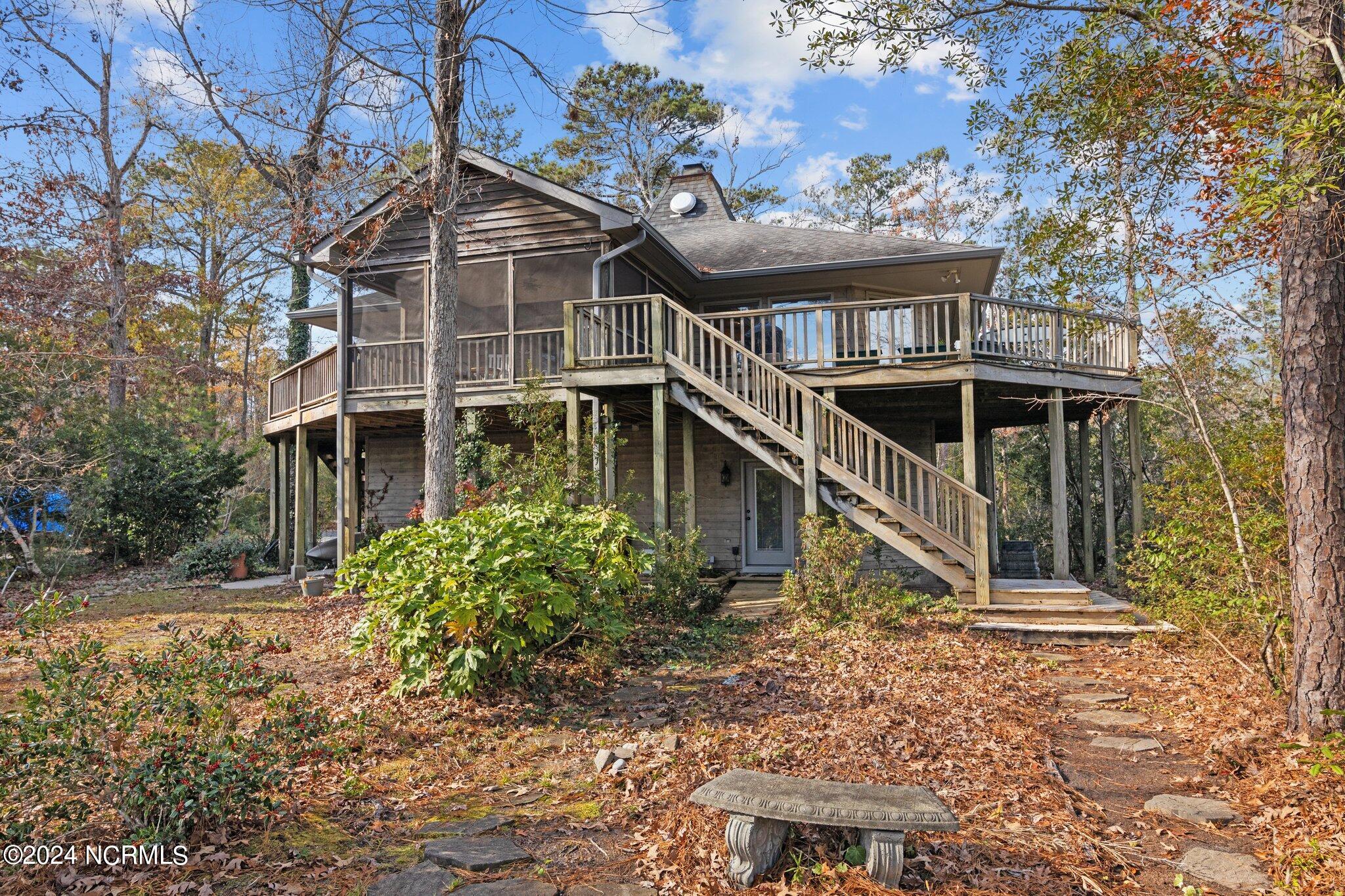 waterfront home in the trees