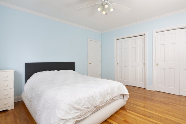 259 Beacon Street, Unit 71 Boston, MA 02116 - Photo 6 of 9 a large white bed in a white room