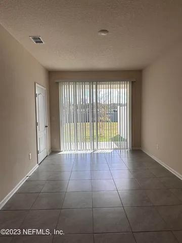 a kitchen with kitchen island cabinets and oven