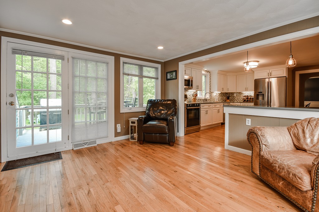 27 Stonebridge Road Wayland, MA 01778 - Photo 3 of 19 a living room with stainless steel appliances furniture and a large window
