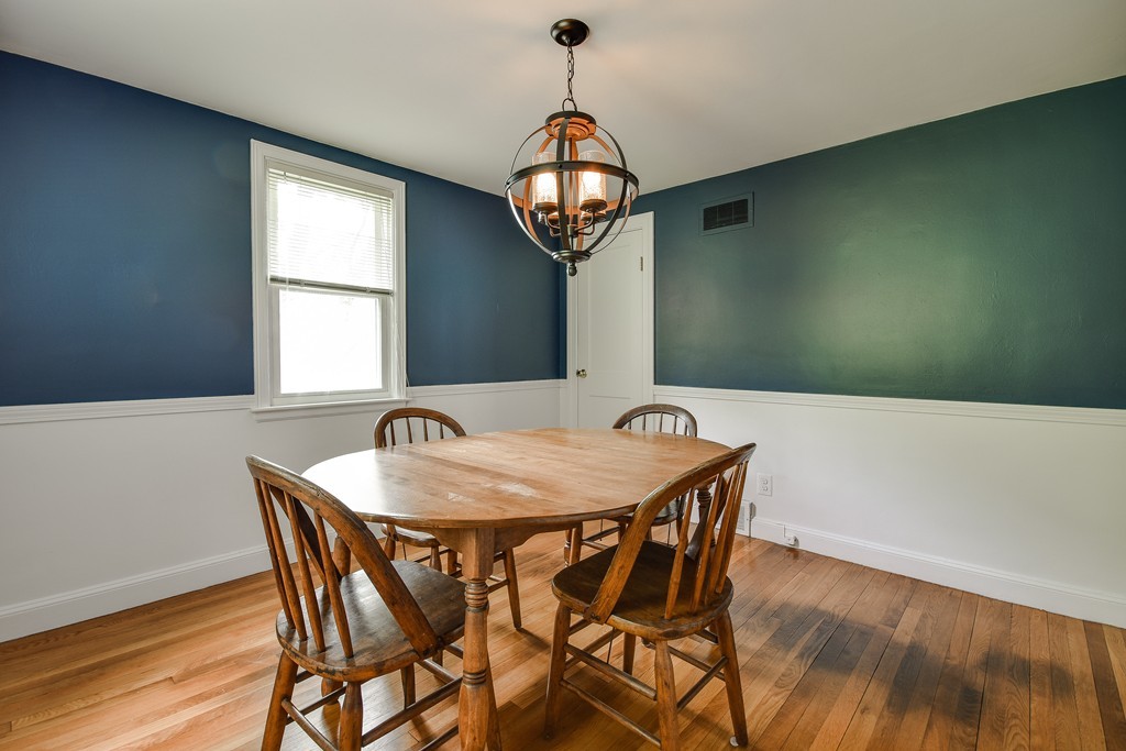 27 Stonebridge Road Wayland, MA 01778 - Photo 7 of 19 a table with table and chairs