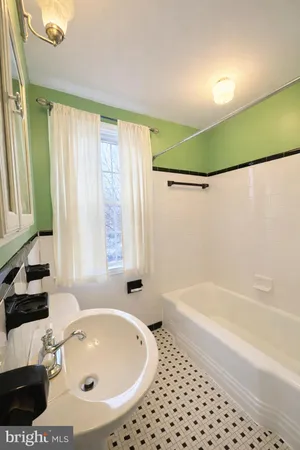 a bathroom with a sink and a bathtub