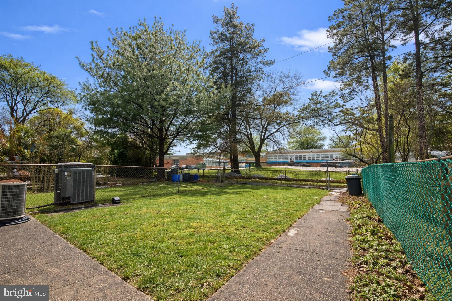 7028 Heathfield Road Baltimore, MD 21212 - Photo 3 of 23 a view of a park with large trees