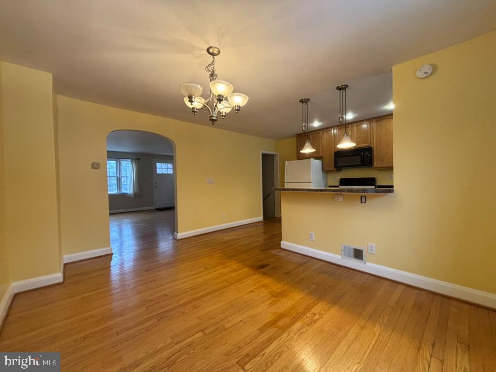 7028 Heathfield Road Baltimore, MD 21212 - Photo 10 of 23 a view of a livingroom with a kitchen