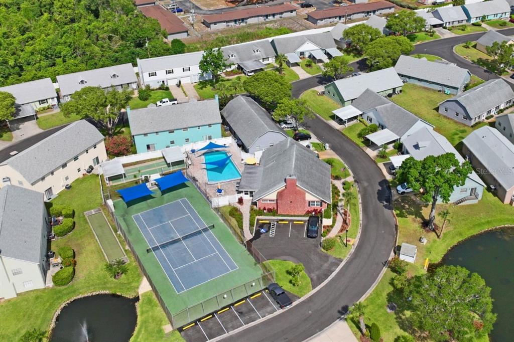 6101 Elmhurst Drive, Unit 5B New Port Richey, FL 34653 - Photo 32 of 45 an aerial view of a swimming pool