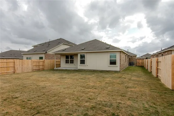 a view of a house with a garage