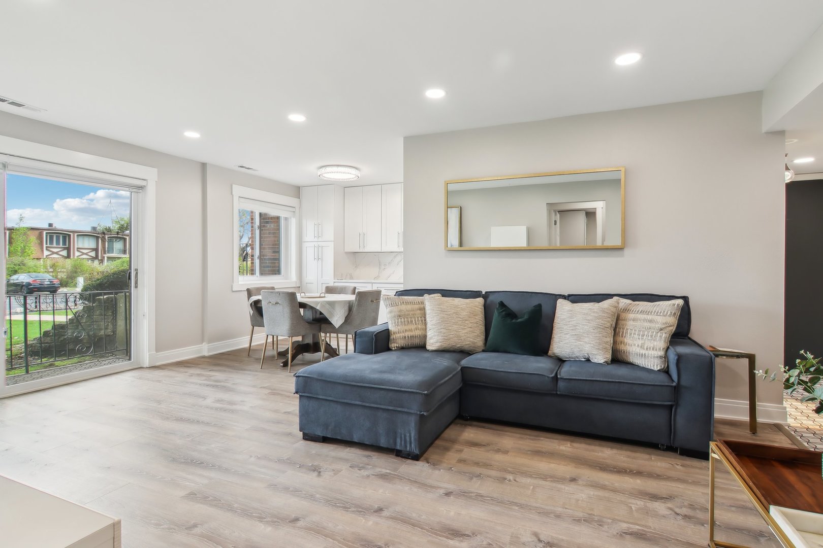 5704 West 128th Street, Unit 1C Crestwood, IL 60418 - Photo 16 of 29 a living room with furniture and a large window