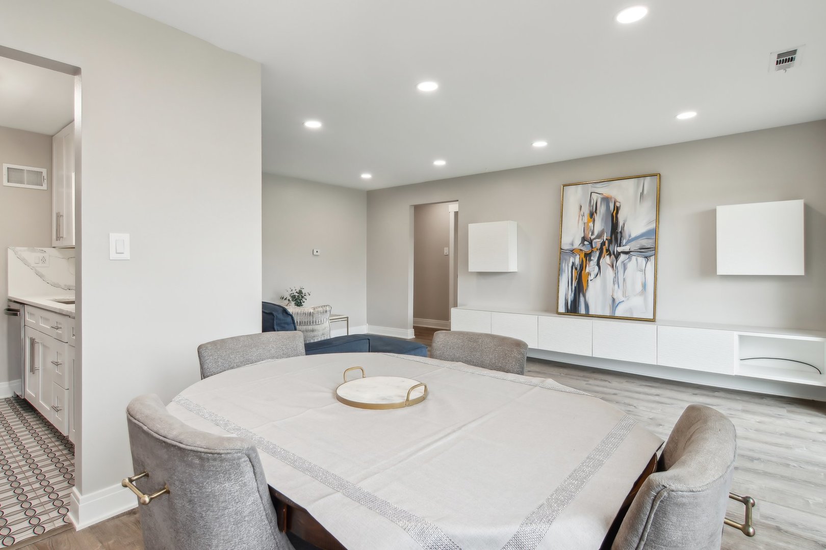 5704 West 128th Street, Unit 1C Crestwood, IL 60418 - Photo 22 of 29 a large white kitchen with sink and a refrigerator