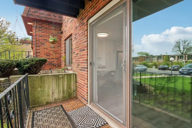 a view of a balcony with chair