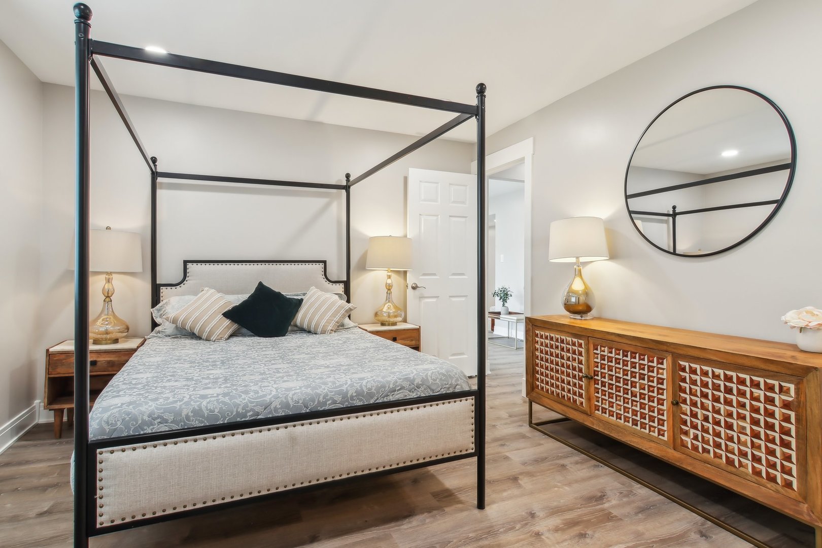5704 West 128th Street, Unit 1C Crestwood, IL 60418 - Photo 7 of 29 a bedroom with a bed window and a potted plant on the wall