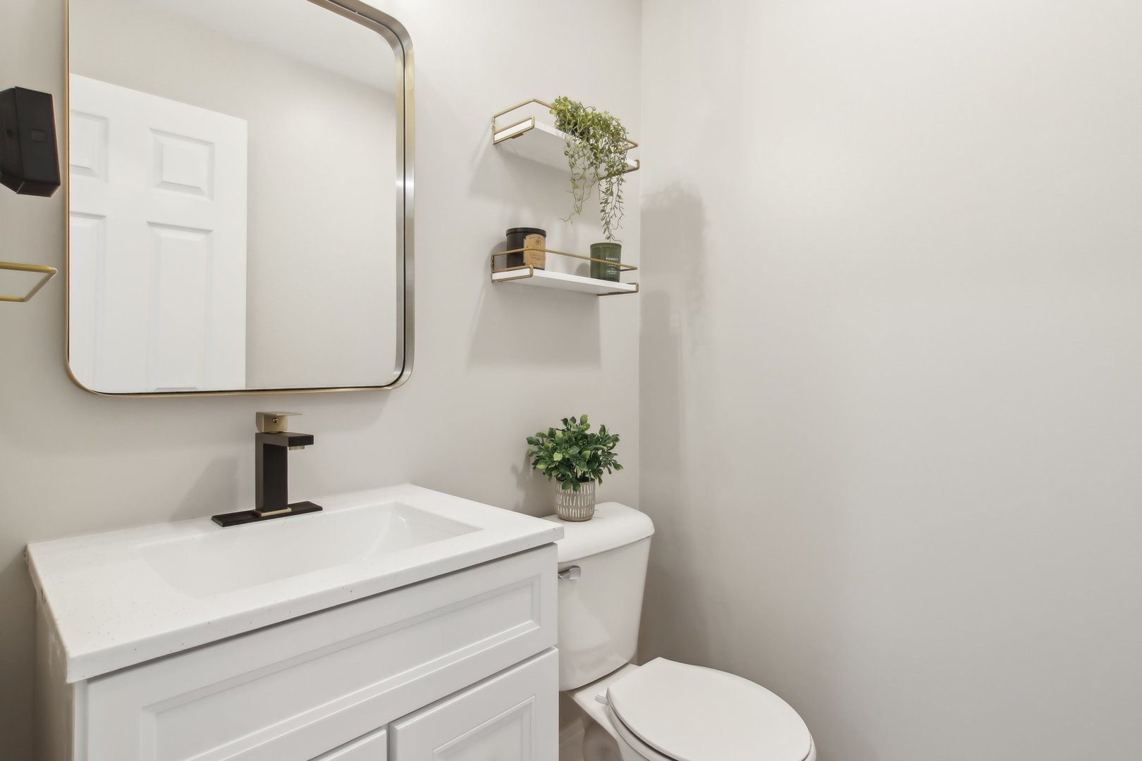 5704 West 128th Street, Unit 1C Crestwood, IL 60418 - Photo 9 of 29 a bathroom with a sink a toilet and mirror