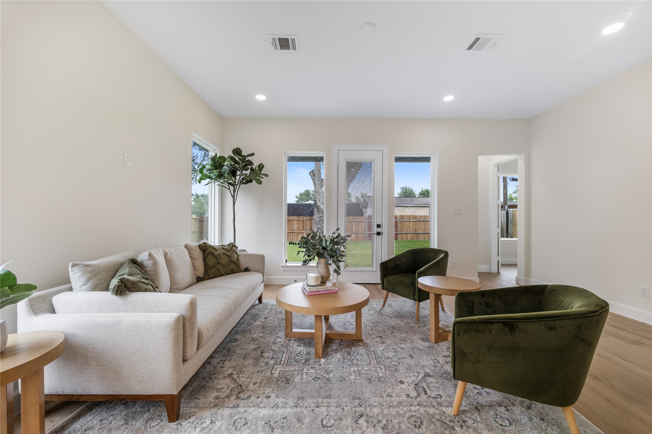 8646 Alcott Drive Houston, TX 77080 - Photo 14 of 44 a living room with furniture and a potted plant