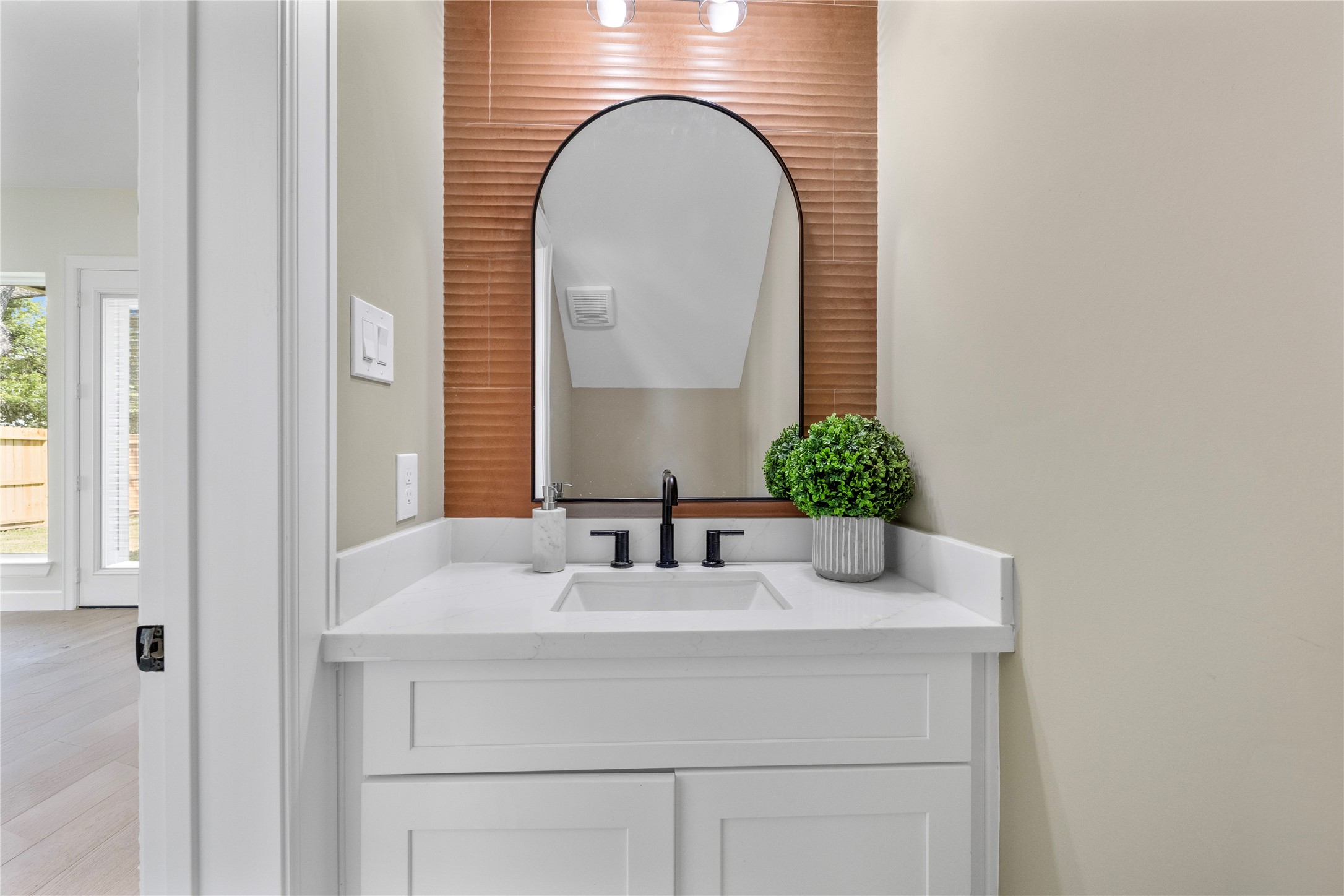 8646 Alcott Drive Houston, TX 77080 - Photo 15 of 44 a bathroom with a sink and a mirror