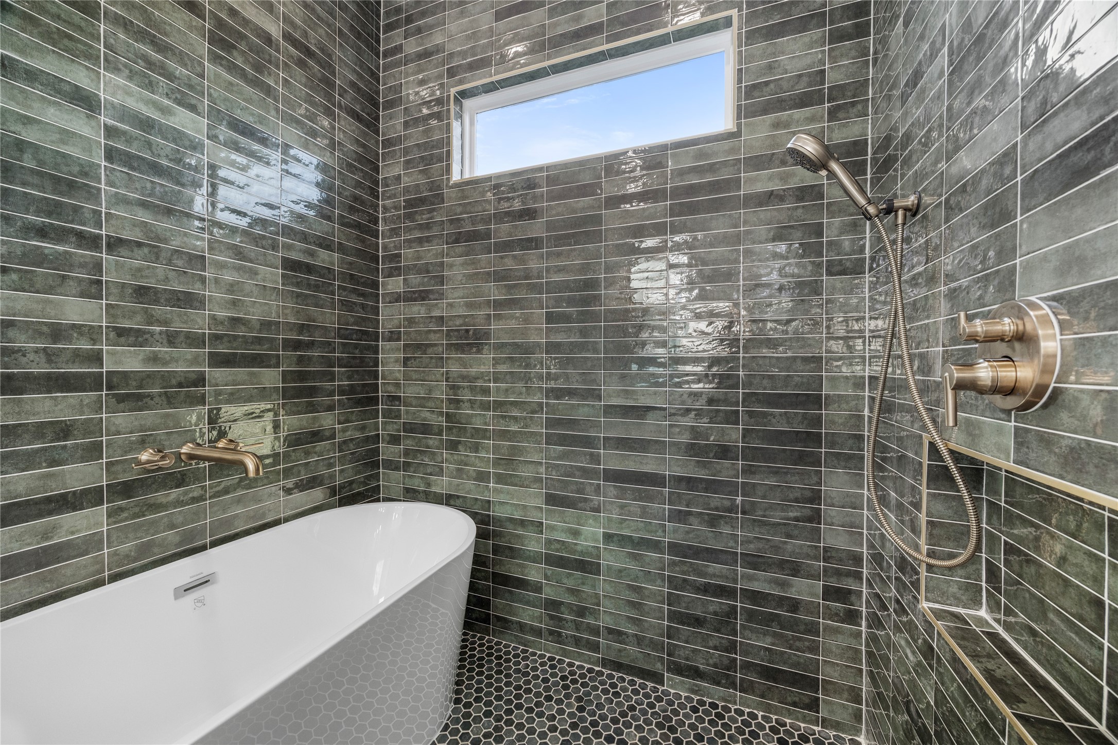 8646 Alcott Drive Houston, TX 77080 - Photo 19 of 44 a bathroom with a shower