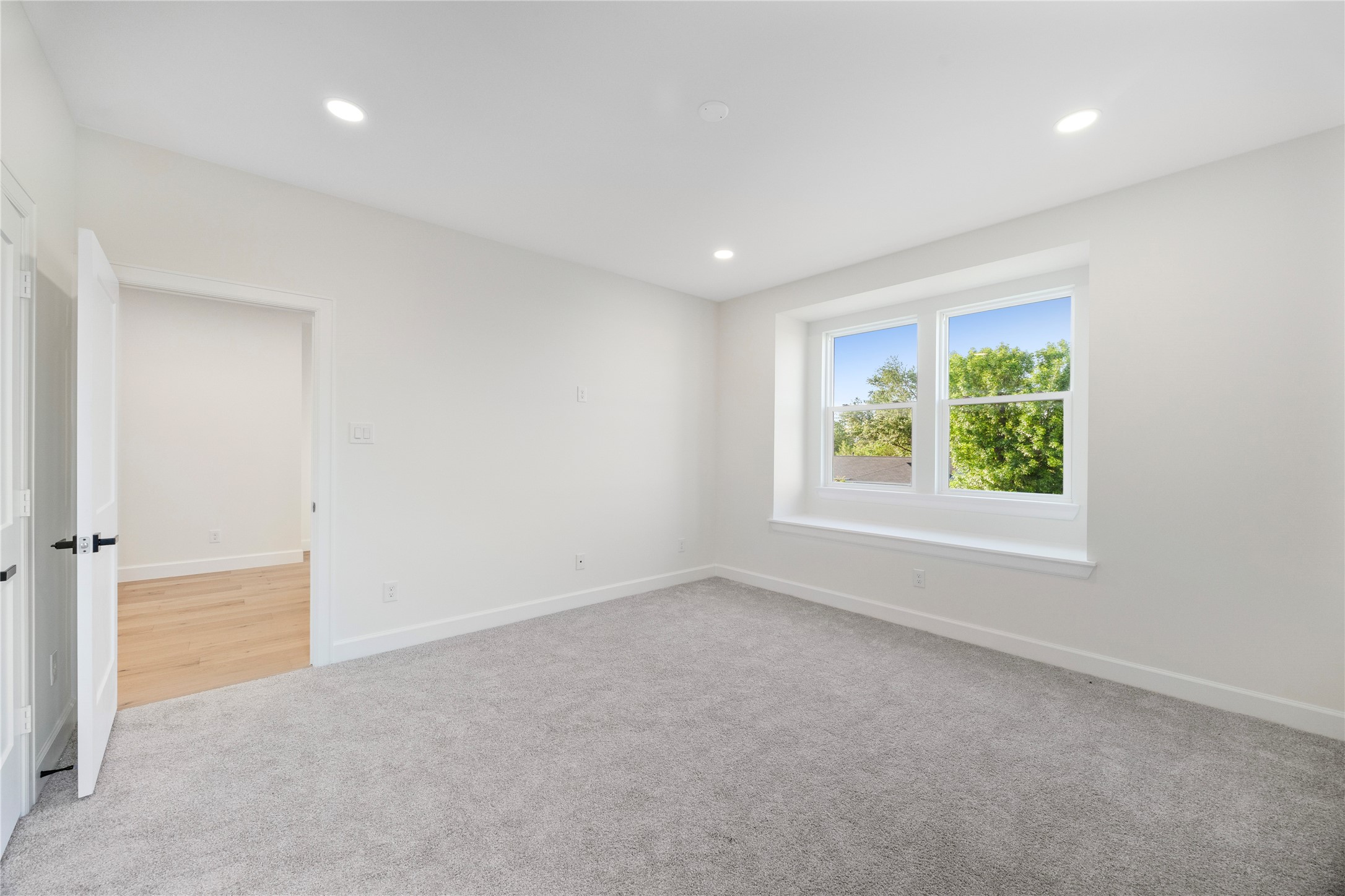 8646 Alcott Drive Houston, TX 77080 - Photo 32 of 44 an empty room with windows