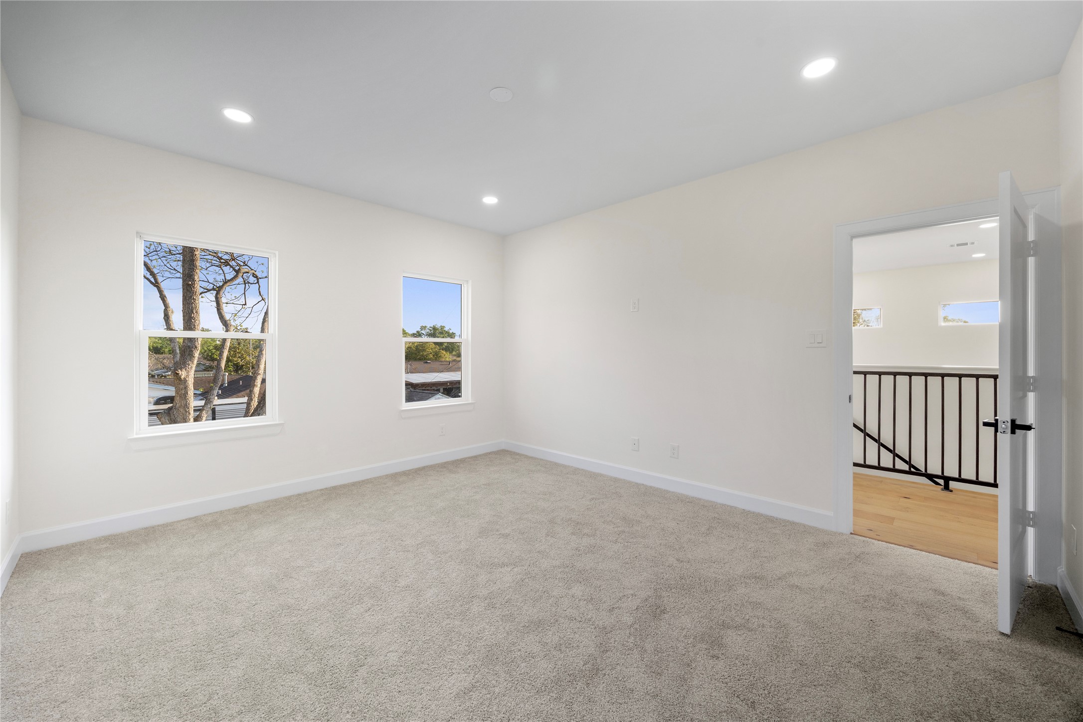 8646 Alcott Drive Houston, TX 77080 - Photo 37 of 44 an empty room with windows