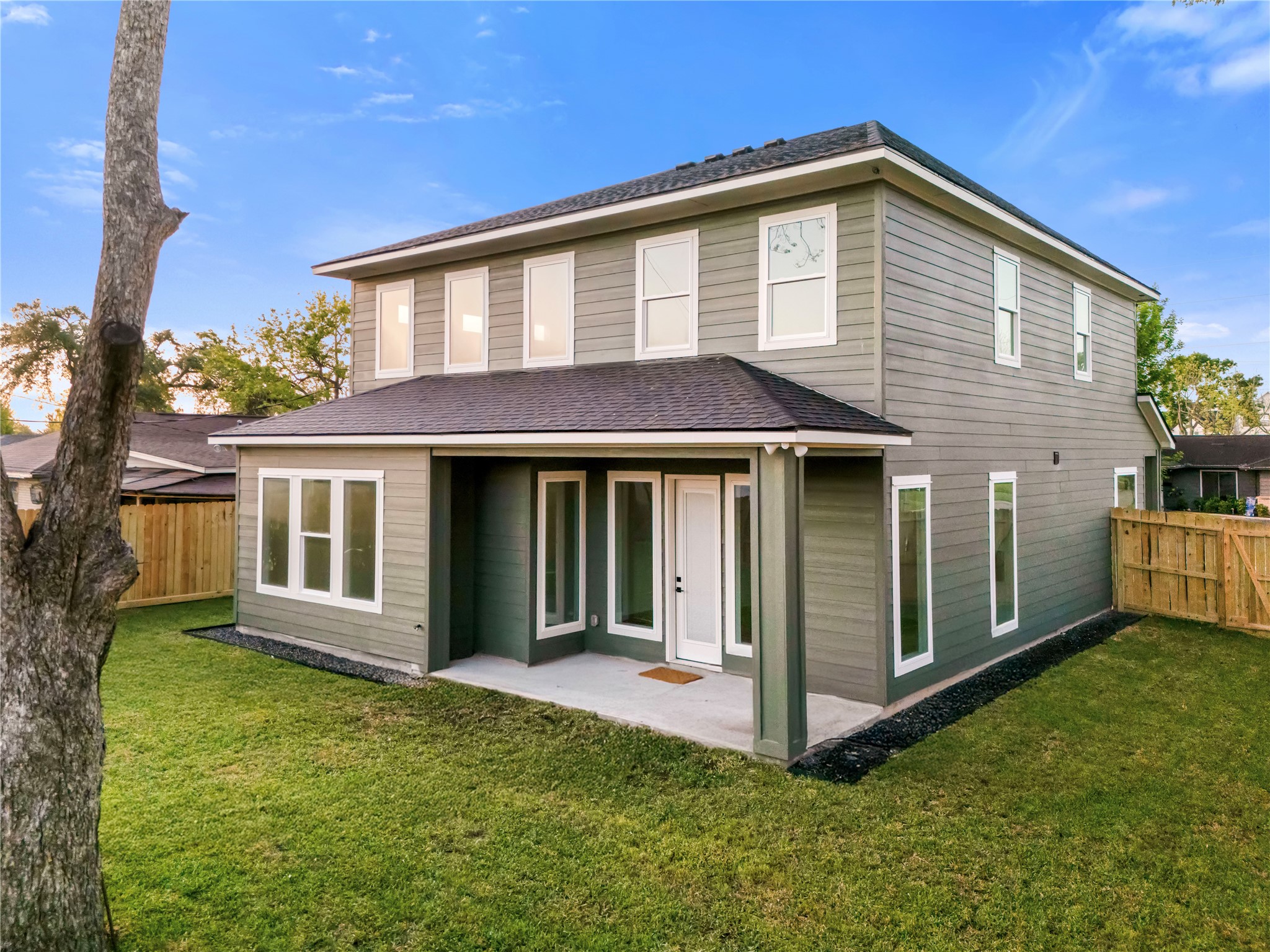 8646 Alcott Drive Houston, TX 77080 - Photo 41 of 44 a front view of a house with a yard