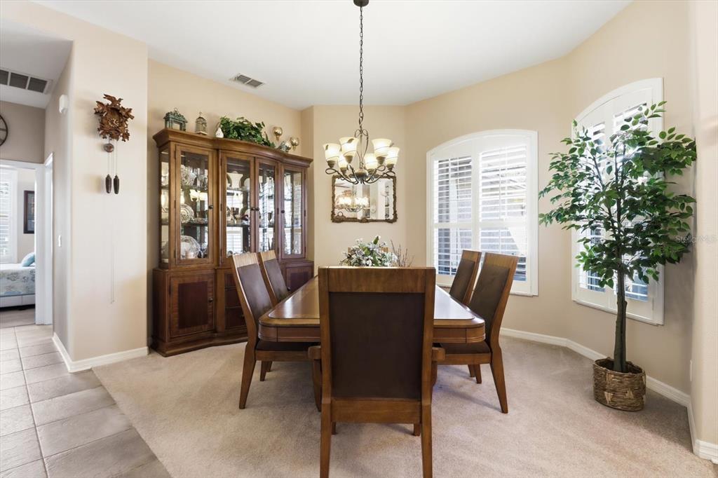 6 Carnation Court Homosassa, FL 34446 - Photo 15 of 48 a view of a dining room with furniture and a window