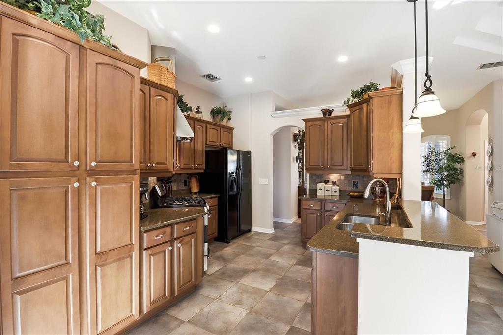 6 Carnation Court Homosassa, FL 34446 - Photo 17 of 48 a kitchen with refrigerator and sink
