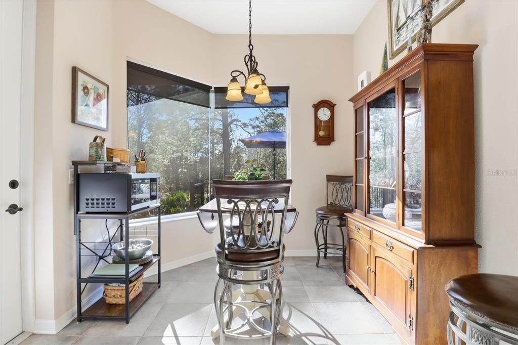 6 Carnation Court Homosassa, FL 34446 - Photo 20 of 48 a view of a dining room with furniture window and outside view