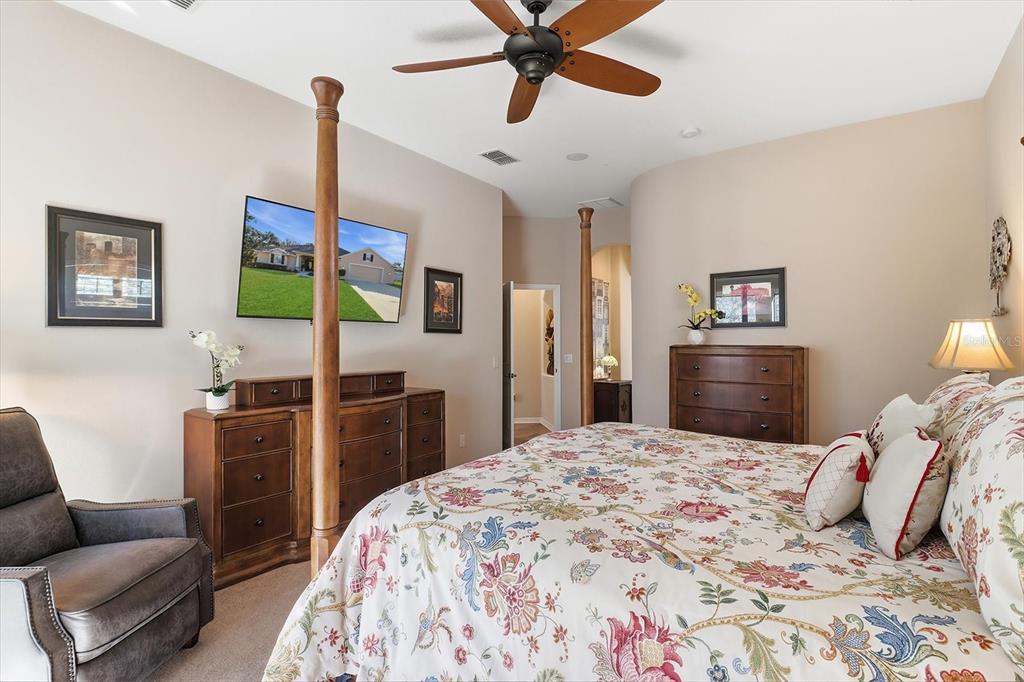6 Carnation Court Homosassa, FL 34446 - Photo 22 of 48 a bedroom with a bed and furniture