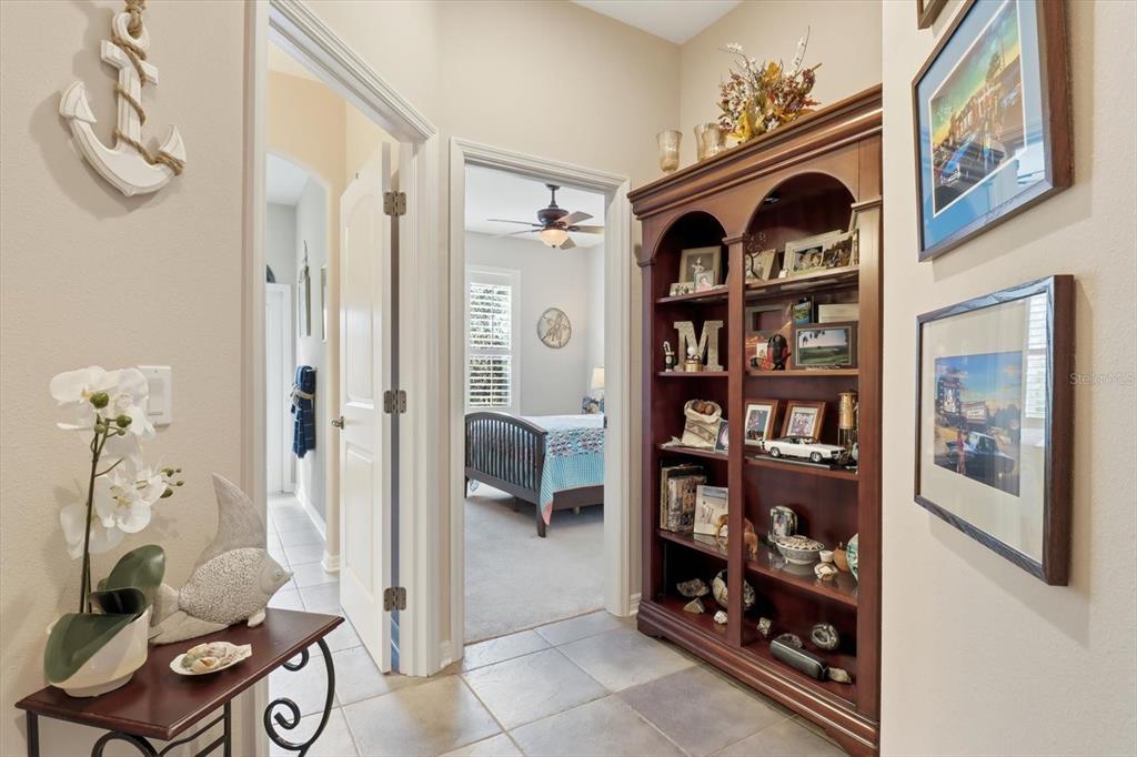 6 Carnation Court Homosassa, FL 34446 - Photo 29 of 48 a view of livingroom with furniture and book shelf