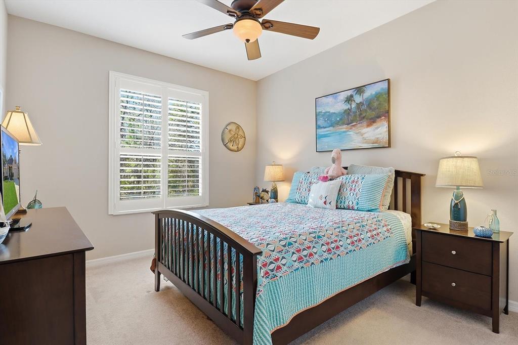6 Carnation Court Homosassa, FL 34446 - Photo 30 of 48 a bedroom with a bed and a window