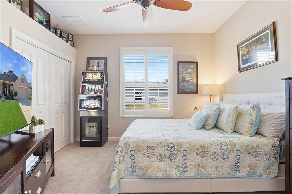 6 Carnation Court Homosassa, FL 34446 - Photo 33 of 48 a bedroom with a bed and a window