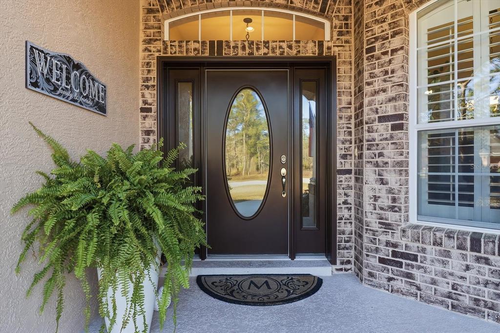6 Carnation Court Homosassa, FL 34446 - Photo 5 of 48 a view of a bird door of the house