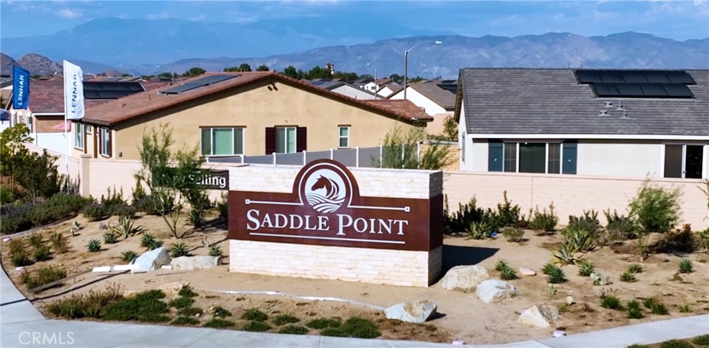 5222 Chaps Way Hemet, CA 92545 - Photo 14 of 15 a front view of a house with a yard