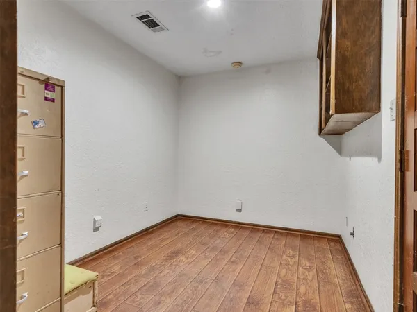 a view of a hallway with closet