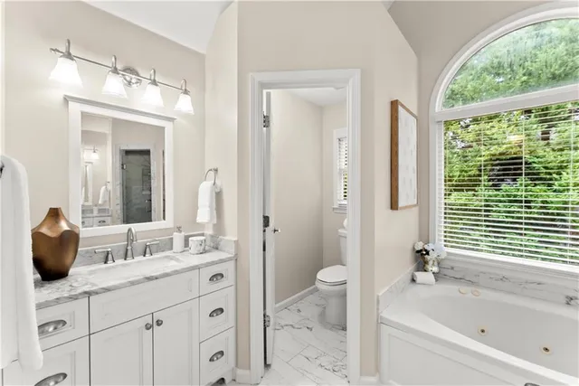 an aerial view of a residential apartment building with outdoor space