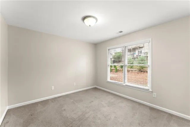 an aerial view of a house with a ocean view