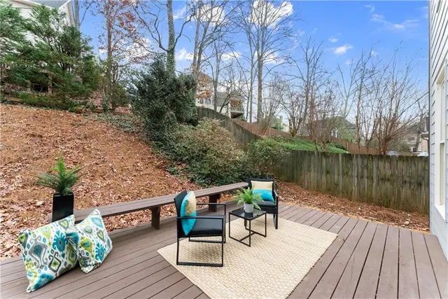 a bathroom with a bathtub and a window