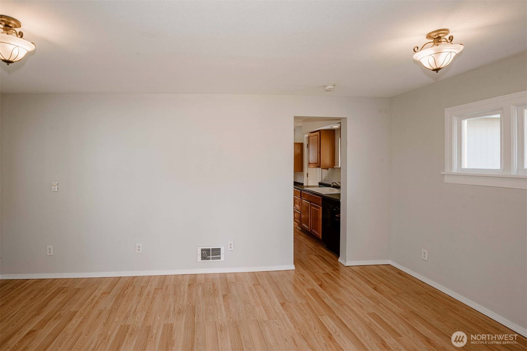 2220 Summit Avenue Everett, WA 98201 - Photo 4 of 26 wooden floor in an empty room with a window