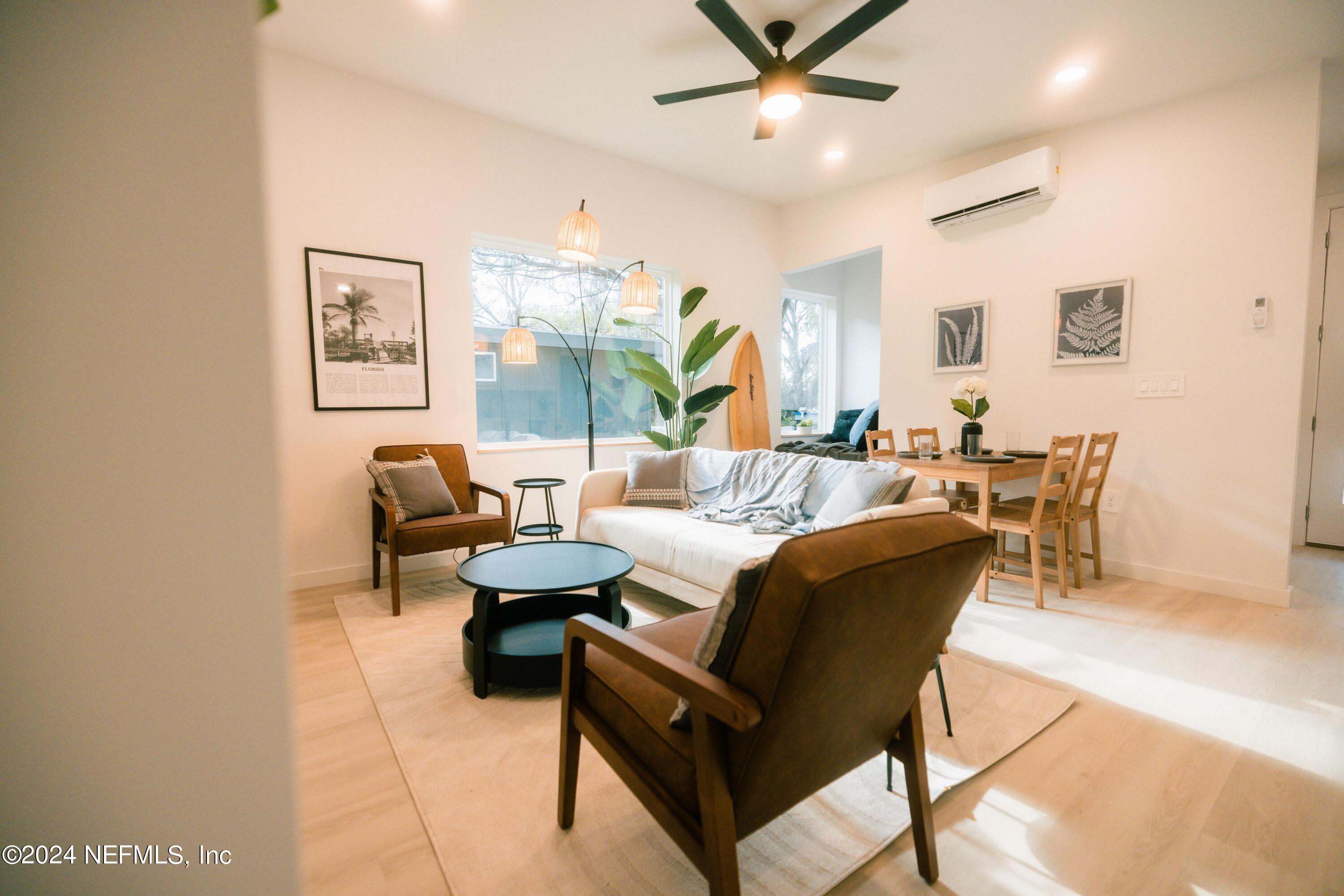 673 Julia Street St. Augustine, FL 32084 - Photo 2 of 21 a living room with furniture and a large window